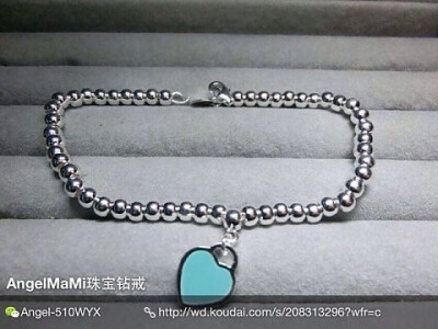 Return to Tiffany系列 珠式手链 迷你纯银双面 Heart Tag，一面镶 Tiffany Blue 珐琅，另一面镶 Return to Tiffany。配珠式手链。