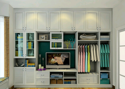 满墙的整体衣柜，抽屉和掩门柜的不规则搭配使衣柜充满视觉动感。