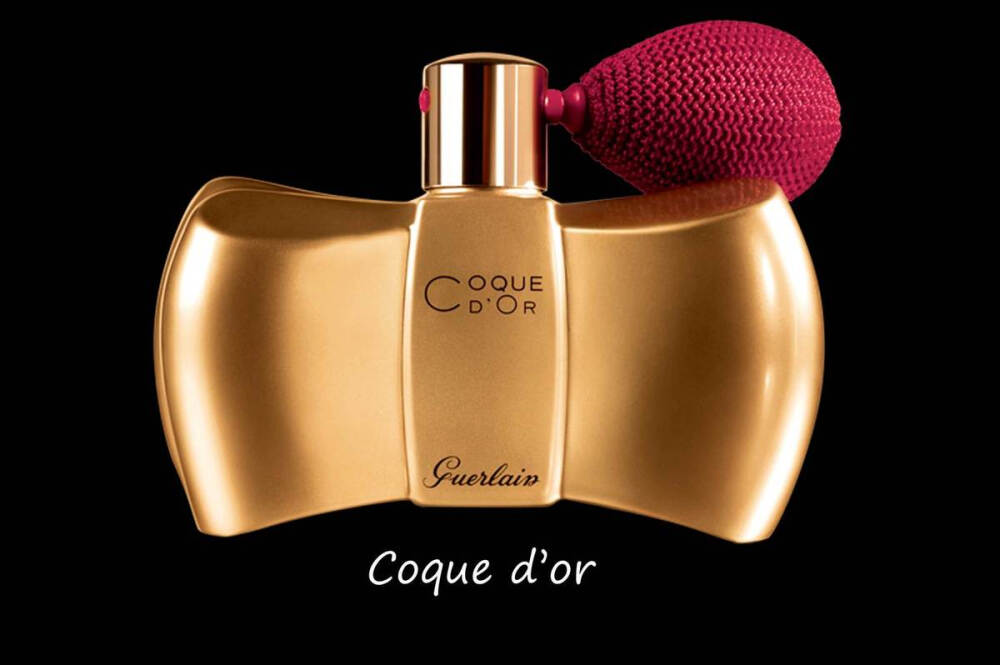 Guerlain 娇兰 Un soir à l’Opéra 2014 圣诞彩妆系列 流金岁月香氛 Coque d’Or：由娇兰第三代调香师Jacques Guerlain创造，其灵感来源于男士在晚宴上佩戴的领结及芭蕾舞者脚上的蝴蝶结。