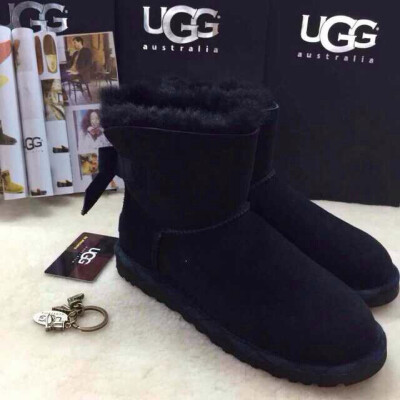  ugg2014限量版！ugg最新爆款专柜正品蝴蝶结代工厂正品材质，正品大底，真正澳洲羊皮毛一体；有非常正的3色，货真价实，只做精品，'35～39。 3539039