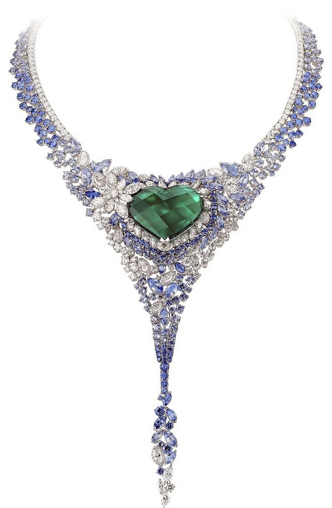 The 40ct heart-shaped emerald and sapphire necklace by AVAKIAN worn by Actress Ornella Muti on the amfAR red carpet.