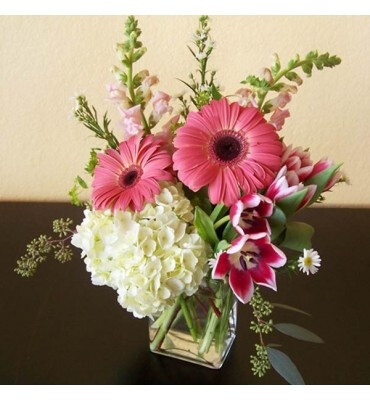 Gerbera daisies, hydrangea, tulips and snapdragons.