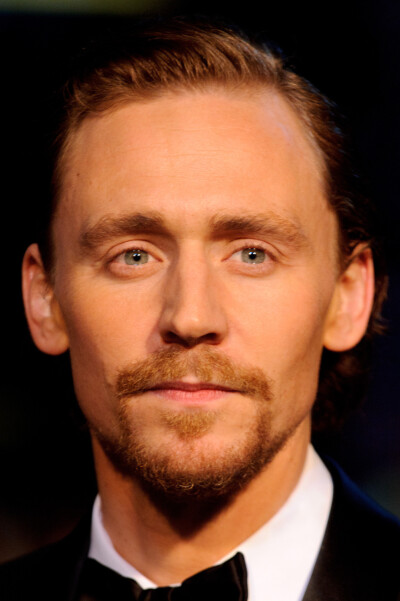 Tom Hiddleston attends the UK premiere of War Horse at Odeon Leicester Square on January 8, 2012 in London, England