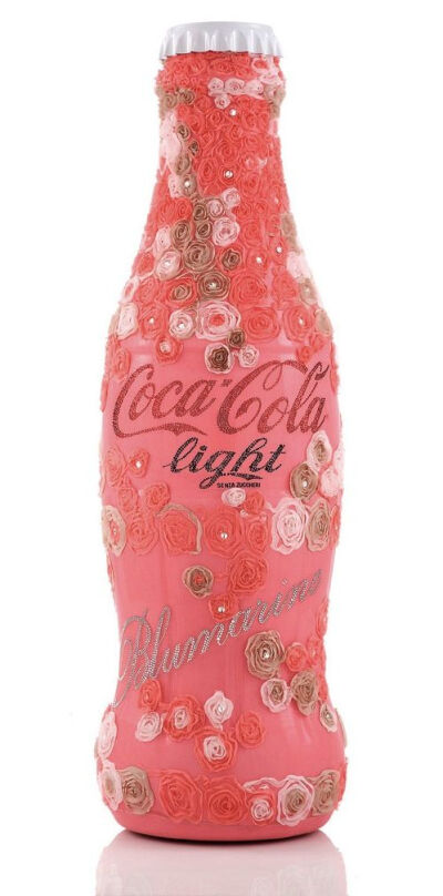 Limited Edition Coke Light bottles. This was my fav by designer Blumarine. by.沈弘