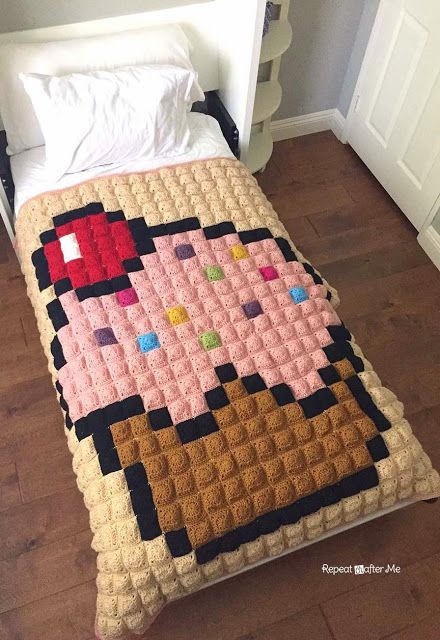 http://www.repeatcrafterme.com/2015/05/crochet-cupcake-pixel-blanket.html