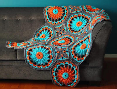 http://www.ravelry.com/patterns/library/crocheted-daisy-afghan
