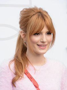 I love these long bangs parted in the middle and also this strawberry blonde color gorgeous on fair skin:)