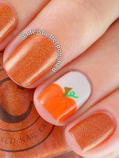 The matching glittery orange polish rounds out this fall-ready mani. Get the easy step-by-step tutorial to creating small pumpkins.