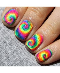 Make a loud statement this Summer with neon rainbow tie dye nail art. It'll brighten things right up! Click here for the tutorial courtesy...