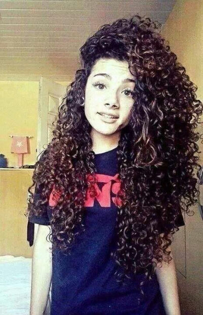 Long curly hair. This is what my hair will look like in about 5 years:(