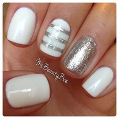 White Silver Striped Nails. Gelish - Arctic Freeze (White). For the stripes I used Vinyl Tape Sally Hansen Insta-Dri - Silver Sweep a little bit of glitter on top. Accent Glitter Nail - Martha Stewart…