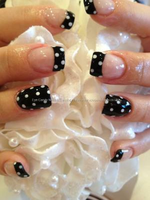 Black polish with white polka dot nail art. Would look cute with Pink instead of the Black