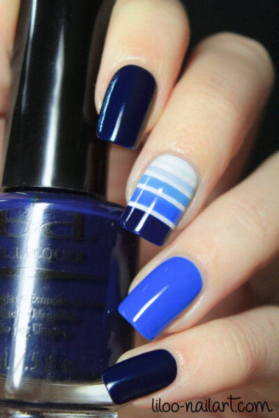 Pretty Painted Fingers &amp;amp; Toes Nail Polish| Serafini Amelia| Love this gradient blue stripe mani from Liloo