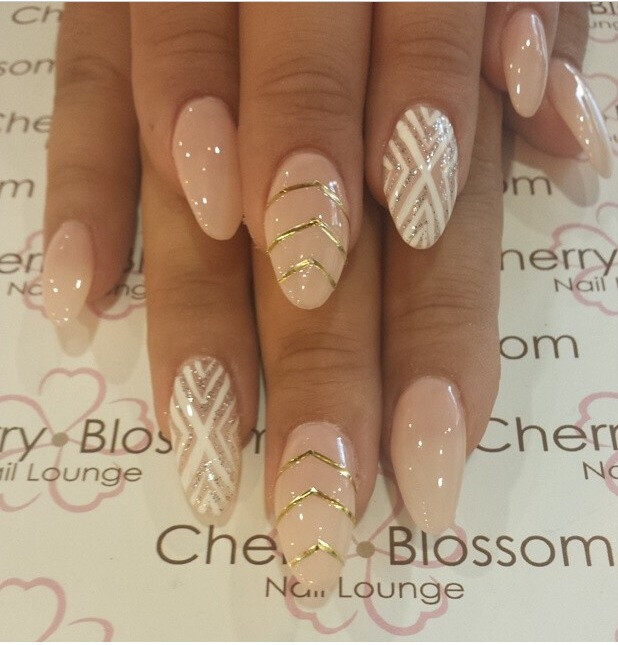 Nude color with design in almond shape