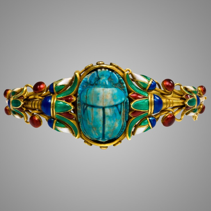 An Egyptian Revival Style Gold and Enamel Scarab Bracelet (1880) Via. Cheryl Hudson