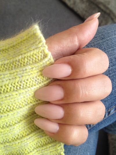 nude almond nails. Am feeling the almond trend. Not quite stiletto nail but safer maybe.