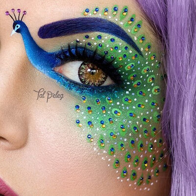 This detailed peacock eye makeup would be a great alternative to a Halloween costume.