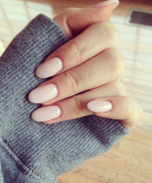 soft pink with almond shaped acrylics. Love the look of the almond shape but dont think I could pull it off!