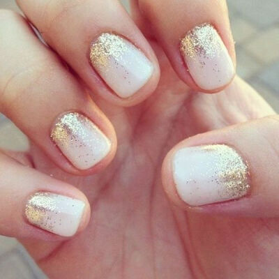 Gorgeous soft pink nails with a golden touch. Get the look using a variety of nail polish from Duane Reade.