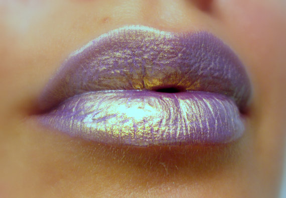 This holographic lilac with golden shimmer gloss will be a perfect addition to your collection! PLEASE NOTE: it is hard to convey the exact color,