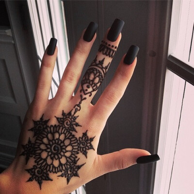 I really want a henna tattoo. My mom thinks it's a real tattoo. Uhh, I'm way to young for a REAL tattoo.