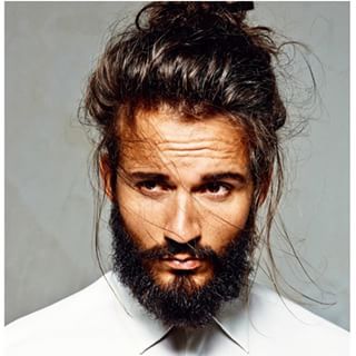 This brooding beefcake. | 23 Beard And Man Bun Combinations That Will Awaken You Sexually