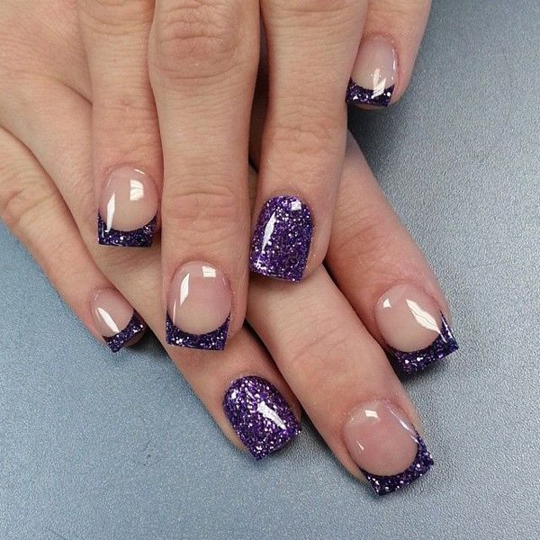 Pretty looking French tips in violet glitter! The nails use clear nail polish as the base coat while coloring the tips in violet nail polish, glitters are also added as a wonderful accent.