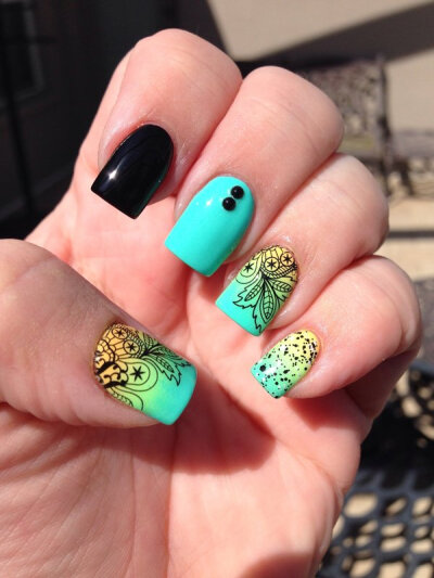 Pueen gradient nails. These are water tattoos but would look just as cool with a similar nail stamp.