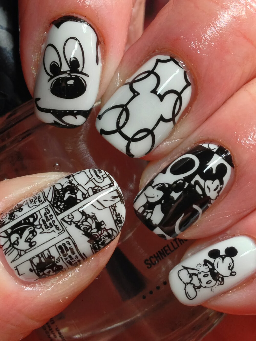 Dont think i would ever do this on my nails if i ever could, but looks pretty cool!