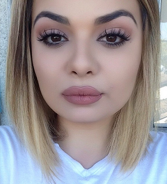 Long lashes, matte skin, and an overdrawn upper lip are beauty staples of Kylie Jenner's selfies. This fan took the look to the next level.