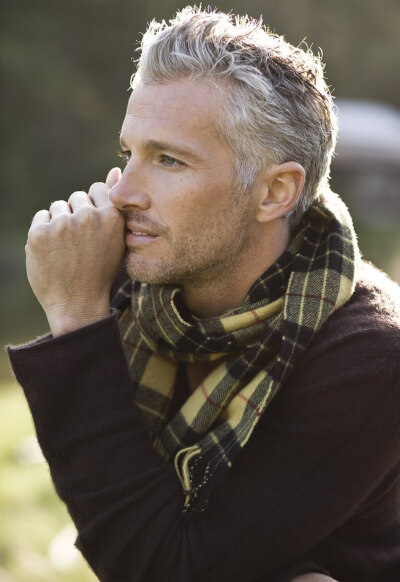 Black &amp;amp; yellow men's scarf. Salt &amp;amp; pepper hair &amp;amp; stubble facial hair. Michael Justin, really makes older gentlemen look great.