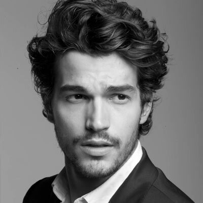 Check out these pictures for the best hairstyles for men 2015 for curly hair. It's all about wearing hair a little longer and looser all over.