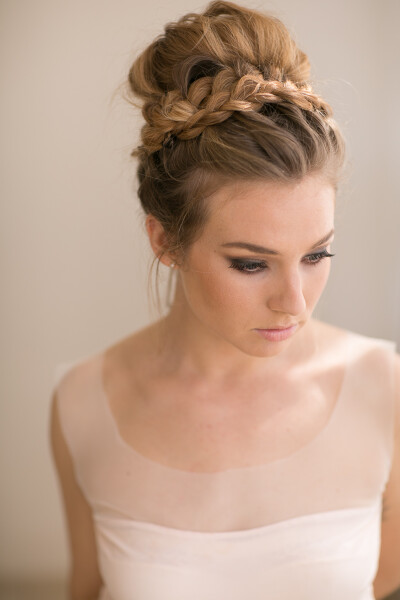 Gorgeous braid with top bun, a perfect prom look. This is so much easier to do using a matching fake braid.