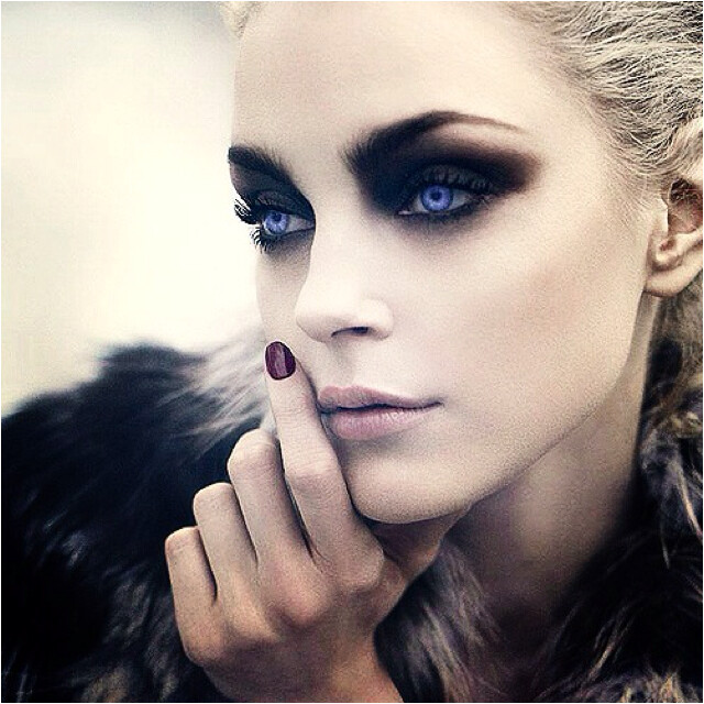 Makeup...certainly too stylized for an everyday look, but it would be pretty awesome for Halloween.