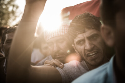 Hundreds of people in the Turkish village of Suruc, near the border town of Kobane in northern Syria, accompany the coffins of three Kurdish fighters who died while battling ISIS militans. Suruc,Urfa…