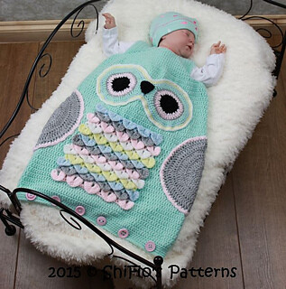 http://www.ravelry.com/patterns/library/owl-sleeping-bag-crochet-pattern-327