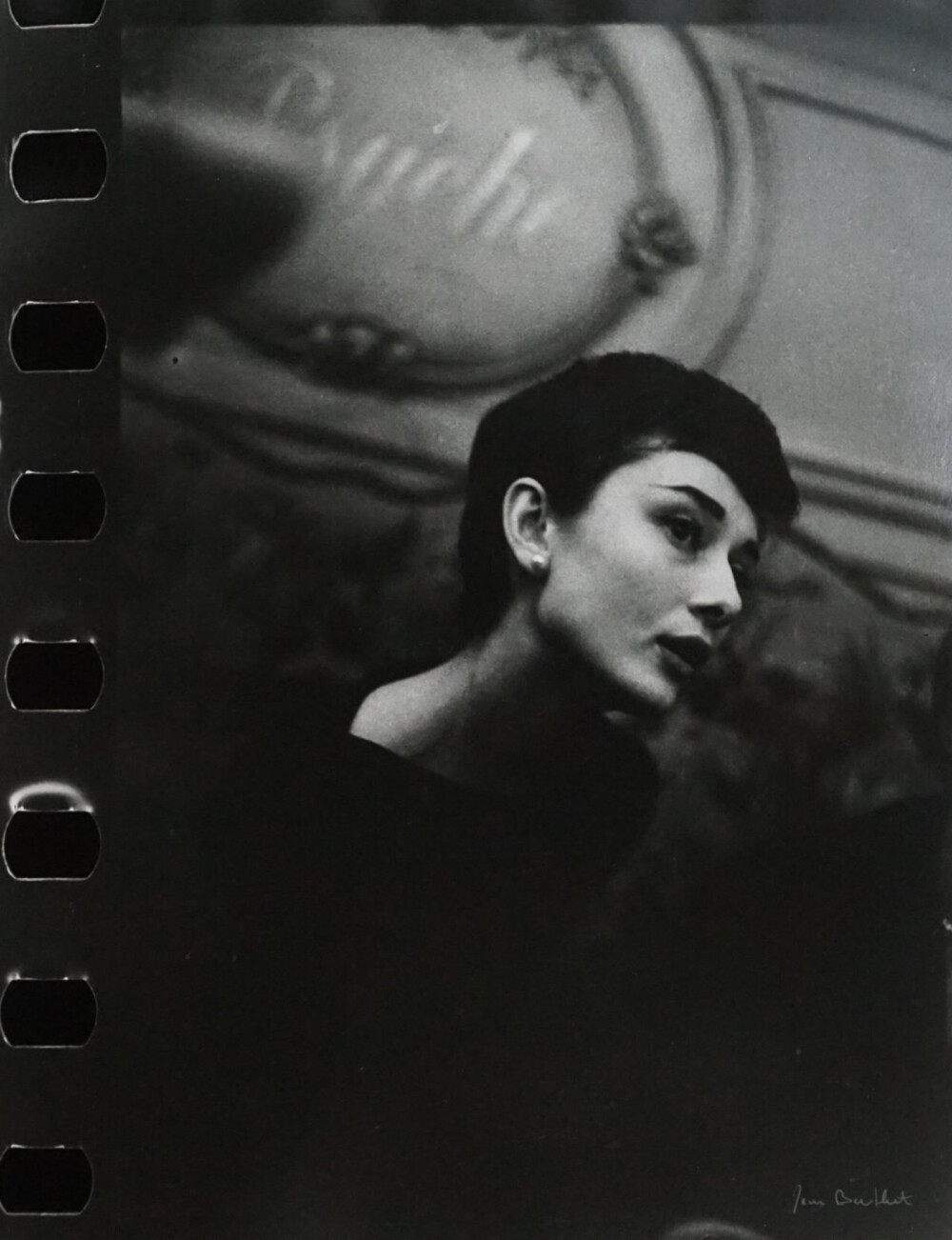 Audrey Hepburn in Parisian hotel,1955 .Photo probably by Garofalo Jack