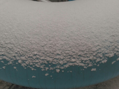 snow on a blue tube in the blue season