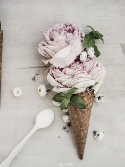 Fancy making some floral art? These rose ice cream cones are a great idea for table decorations! #Flowers #AldiFavouriteThings: