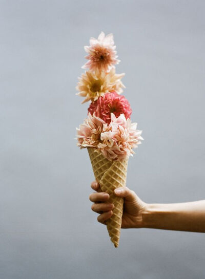 Flowers and ice cream delicately designed by botanical maven Amy Merrick. Photographer Parker Fitzgerald captures perfectly melted ice cream blended with pastel hues of various Spring flowers.: