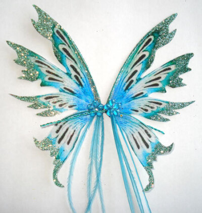 OOAK Fairy Pixie Fantasy Art Doll Wings ADSG IADR ( picture was found on the Esty shop: IndigoMoonWings)
They are made using high quality transparent film and are embellished with glitter and gems.
T…