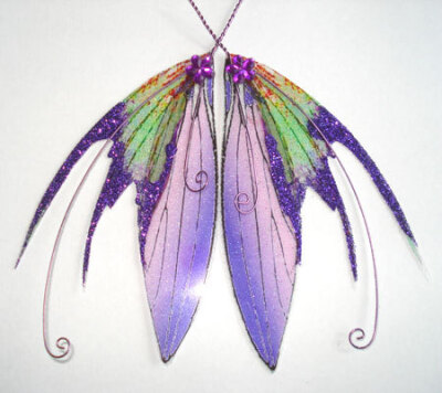 OOAK Fairy Pixie Fantasy Art Doll Wings ADSG IADR ( picture was found on the Esty shop: IndigoMoonWings)
They are made using high quality transparent film and are embellished with glitter and gems.
T…