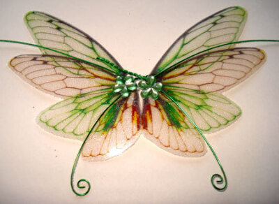 OOAK Fairy Pixie Fantasy Art Doll Wings ADSG IADR ( picture was found on the Esty shop: IndigoMoonWings)
They are made using high quality transparent film and are embellished with glitter and gems.
T…