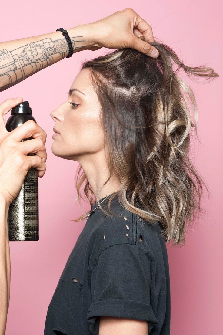 rab a can of texturizing spray or dry shampoo — Tran prefers Oribe's Dry Texture Spray — and blast the roots of your hair, holding the spray 12 inches away from your head. Go section by section, and slowly layer the spray into your locks, avoiding the ends