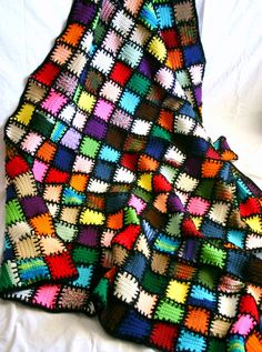 Scrap yarn afghan colorful crocheted lap by lovinghandscrochet
