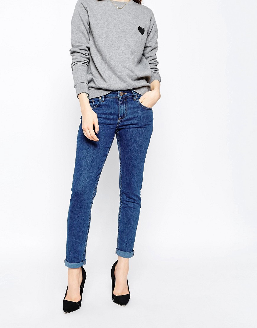 Image 1 of ASOS Kimmi Shrunken Boyfriend Jeans In Conifer Flat Vintage
Blue Wash