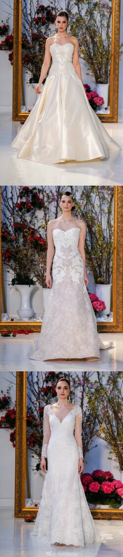 Anne Barge Bridal S/S 2017。纽约著名婚纱设计师的同名品牌，秀场以巨大相框里面放满了鲜花作为背景，新娘们穿着优雅的婚纱礼服和盘发走出，精致的头饰、简洁的婚纱，不仅勾勒出新娘最为曼妙的曲线还突出新娘柔美的一面。