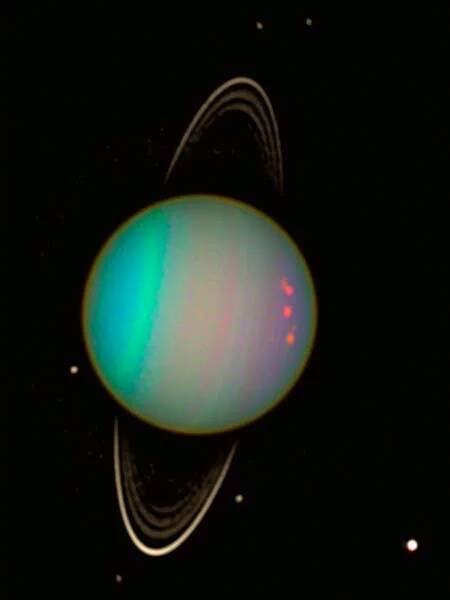 #天文酷图# 天王星的卫星以及环绕着天王星！图片由哈勃空间望远镜拍摄