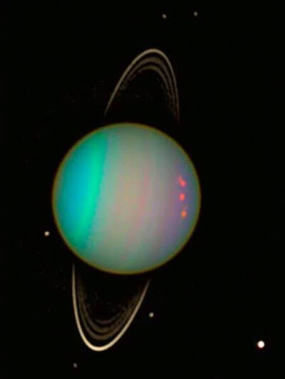 #天文酷图# 天王星的卫星以及环绕着天王星！图片由哈勃空间望远镜拍摄