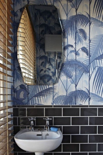  Cole Son Palm Jungle wallpaper in a tiny London bathroom.: